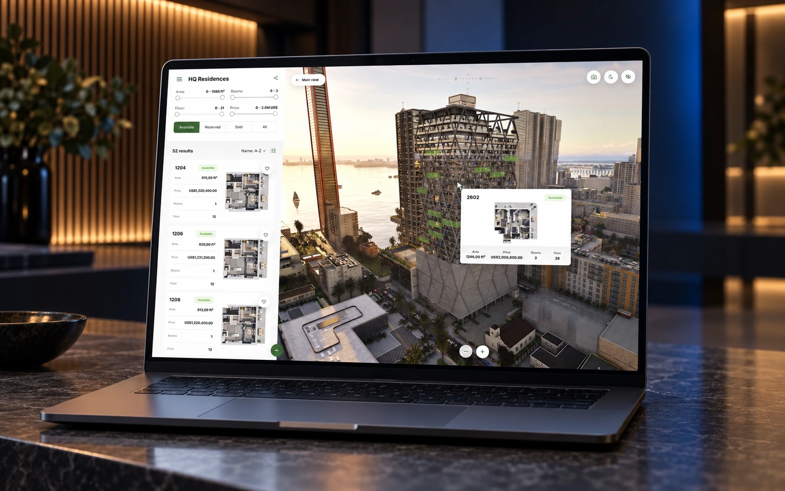 تطبيق HQ Residences على حاسوب محمول في مكتب مبيعات، في مشهد توضيحي للجهاز